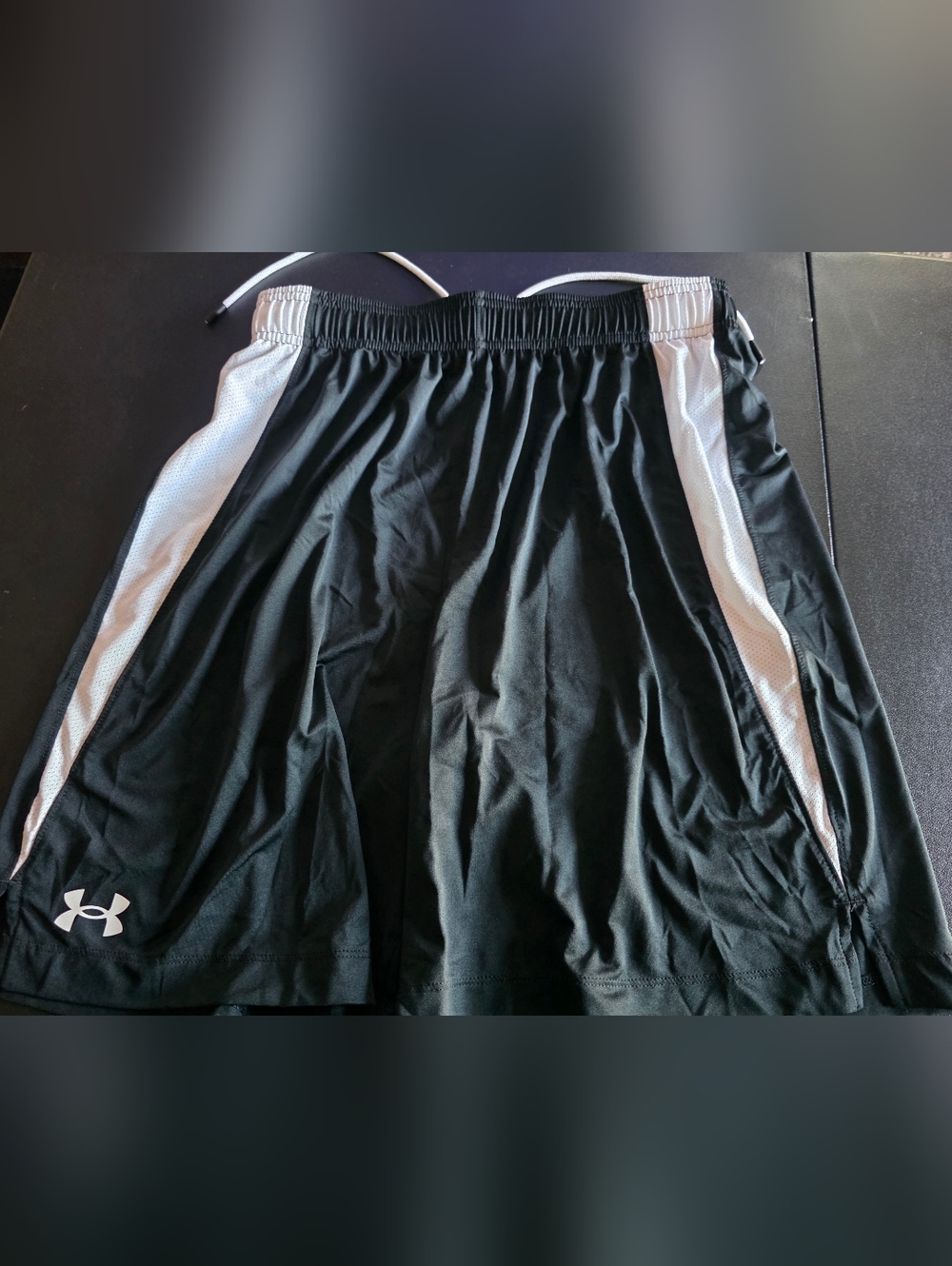 Liked new Mens size medium under armour shorts black and white